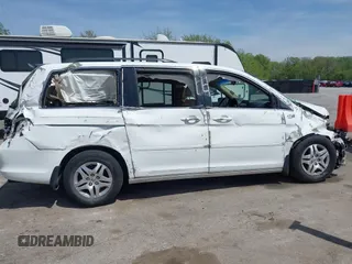 2007 Honda Odyssey EX-L with VIN 5FNRL38617B141003, listed as a IAAI auction lot 39232543 with 195,096 mi miles and . Bid and sale history available at DreamBid. Image 13.