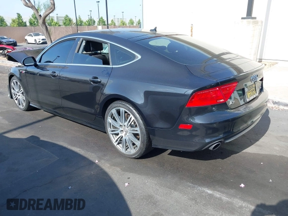 2014 Audi A7 Prestige with VIN WAU2GAFC5EN012583, listed as a IAAI auction lot 42561824 with Not provided miles and . Bid and sale history available at DreamBid. Image 3.
