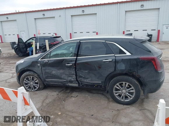 2021 Cadillac XT5 AWD Premium Luxury with VIN 1GYKNDRS7MZ168493, listed as a IAAI auction lot 41395162 with 33,064 mi miles. Bid and sale history available at carsss.com. Image 14.