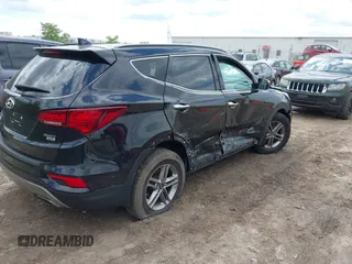 2018 Hyundai Santa Fe 2.4L z VIN 5NMZUDLB2JH058032, wystawiony jako IAAI lot #42206116 z przebiegiem 138 688 mil mil oraz . Historia ofert i sprzedaży dostępna na DreamBid. Obrazek 4.