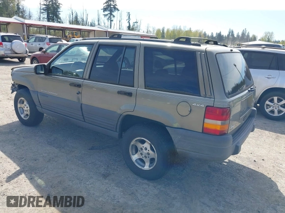 1997 Jeep Grand Cherokee Laredo with VIN 1J4GZ58S5VC500257, listed as a IAAI auction lot 41996034 with 222,513 mi miles and . Bid and sale history available at DreamBid. Image 3.