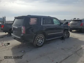2015 GMC Yukon Denali with VIN 1GKS1CKJ2FR699959, listed as a Copart auction lot 42035195 with 0 mi miles and Salvage Title. Bid and sale history available at carsss.com. Image 3.