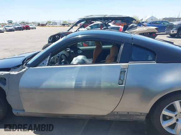 2004 Nissan 350Z Enthusiast z VIN JN1AZ34D74T164233, wystawiony jako IAAI lot #42509421 z przebiegiem 90 780 mil mil oraz . Historia ofert i sprzedaży dostępna na DreamBid. Obrazek 15.
