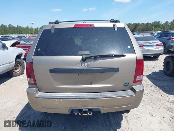 2005 Jeep Grand Cherokee Laredo with VIN 1J4HS48NX5C656582, listed as a IAAI auction lot 42079746 with Not Provided miles and . Bid and sale history available at DreamBid. Image 16.