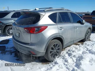 2013 Mazda CX-5 Grand Touring with VIN JM3KE4DE4D0168115, listed as a IAAI auction lot 41610004 with 190,690 mi miles. Bid and sale history available at carsss.com. Image 4.