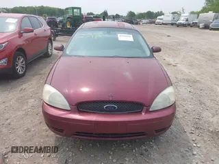 2007 Ford Taurus SEL z VIN 1FAFP56U07A152058, wystawiony jako IAAI lot #42392416 z przebiegiem 209 361 mil mil oraz . Historia ofert i sprzedaży dostępna na DreamBid. Obrazek 6.