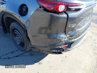2022 Mazda CX-9 Sport with VIN JM3TCBBY5N0614589, listed as a IAAI auction lot 41295944 with 49,193 mi miles and . Bid and sale history available at DreamBid. Image 6.