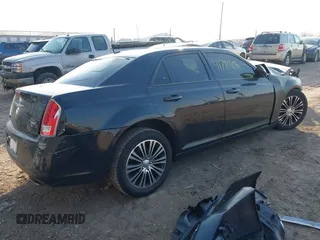 2014 Chrysler 300 with VIN 2C3CCAGT6EH209437, listed as a IAAI auction lot 41780106 with 153,414 mi miles. Bid and sale history available at carsss.com. Image 4.