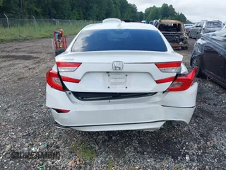 2018 Honda Accord EX with VIN 1HGCV1F40JA048593, listed as a IAAI auction lot 42572510 with 144,604 mi miles and . Bid and sale history available at DreamBid. Image 16.