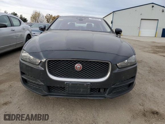 2017 Jaguar XE with VIN SAJAK4BN0HA976222, listed as a Copart auction lot 79069634 with 128,241 mi miles and Clean Title. Bid and sale history available at DreamBid. Image 5.