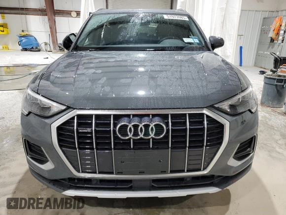 2022 Audi Q3 Premium with VIN WA1AUCF33N1002302, listed as a Copart auction lot 51973985 with 49,886 mi miles and Salvage title. Bid and sale history available at DreamBid. Image 5.