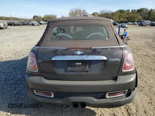 2014 MINI Convertible S with VIN WMWZP3C55ET298172, listed as a Copart auction lot 76977114 with 119,138 mi miles and Salvage title. Bid and sale history available at DreamBid. Image 6.