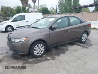 2013 Kia Forte EX with VIN KNAFU4A22D5711825, listed as a IAAI auction lot 42128778 with 112,889 mi miles. Bid and sale history available at carsss.com. Image 2.