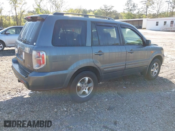 2007 Honda Pilot EX-L with VIN 2HKYF18727H528564, listed as a IAAI auction lot 42010708 with 260,364 mi miles and . Bid and sale history available at DreamBid. Image 4.