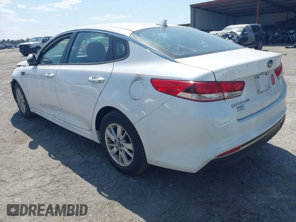 2017 Kia Optima LX with VIN 5XXGT4L39HG129092, listed as a IAAI auction lot 42077810 with 72,912 mi miles and . Bid and sale history available at carsss.com. Image 3.