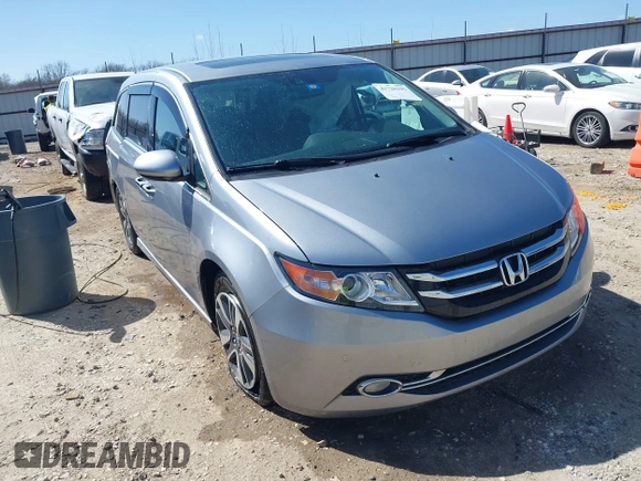 2016 Honda Odyssey Touring Elite with VIN 5FNRL5H96GB090653, listed as a IAAI auction lot 41720195 with 68,969 mi miles. Bid and sale history available at carsss.com. Image 1.