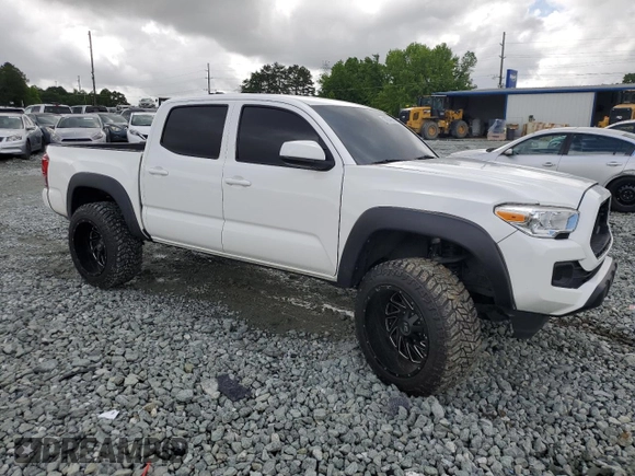 2021 Toyota Tacoma SR с VIN 3TMCZ5AN4MM386662, выставлен на аукционе Copart как лот 56954865 с пробегом 70 623 миль миль и Списание • Salvage title. История ставок и продаж доступна на DreamBid. Изображение 4.