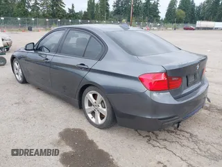 2013 BMW 3 Series 335i xDrive with VIN WBA3B9C54DJ899400, listed as a IAAI auction lot 42444539 with 132,261 mi miles and . Bid and sale history available at DreamBid. Image 3.