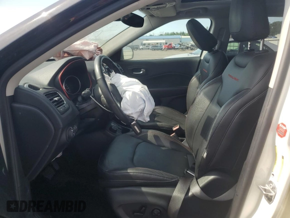 2019 Jeep Compass Trailhawk with VIN 3C4NJDDB5KT647778, listed as a Copart auction lot 62032515 with 51,505 mi miles and Salvage title. Bid and sale history available at DreamBid. Image 7.