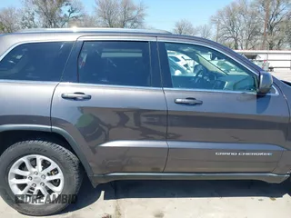 2015 Jeep Grand Cherokee Altitude with VIN 1C4RJEAG0FC952260, listed as a IAAI auction lot 41738692 with 124,197 mi miles. Bid and sale history available at carsss.com. Image 14.