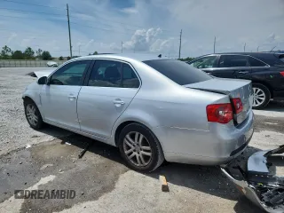 2007 Volkswagen Jetta Wolfsburg Edition z VIN 3VWEF71K57M189021, wystawiony jako Copart lot #59019685 z przebiegiem 124 720 mil mil oraz Szkoda całkowita • Salvage title. Historia ofert i sprzedaży dostępna na DreamBid. Obrazek 2.