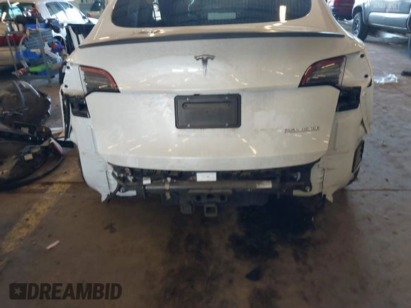 2021 Tesla Model Y Performance with VIN 5YJYGDEF4MF263473, listed as a IAAI auction lot 41851083 with 39,289 mi miles and . Bid and sale history available at DreamBid. Image 6.