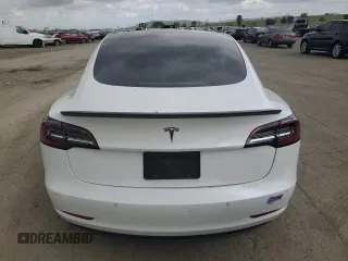 2019 Tesla Model 3 Mid Range with VIN 5YJ3E1EA8KF412886, listed as a Copart auction lot 50824565 with 54,803 mi miles and Salvage Title. Bid and sale history available at carsss.com. Image 6.