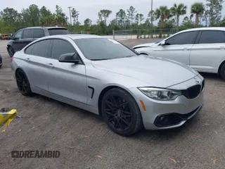 2015 BMW 4 Series 435i with VIN WBA4B1C58FG241018, listed as a IAAI auction lot 41401671 with 79,369 mi miles. Bid and sale history available at carsss.com. Image 1.
