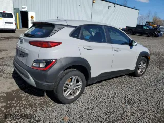 2023 Hyundai Kona SE with VIN KM8K22AB6PU027037, listed as a Copart auction lot 48059565 with 50,098 mi miles and Salvage Title. Bid and sale history available at carsss.com. Image 3.