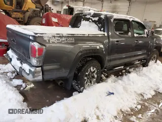 2023 Toyota Tacoma 4WD SR with VIN 3TMCZ5AN4PM625017, listed as a IAAI auction lot 41207111 with 38,582 mi miles. Bid and sale history available at carsss.com. Image 4.