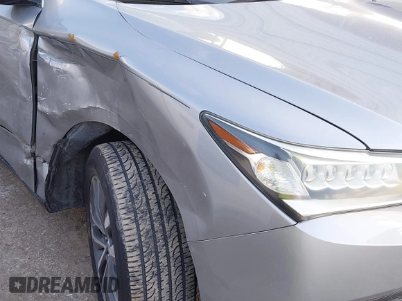 2016 Acura MDX w/Tech with VIN 5FRYD3H4XGB021609, listed as a IAAI auction lot 41459777 with 103,294 mi miles. Bid and sale history available at carsss.com. Image 6.
