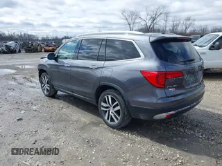 2017 Honda Pilot Touring with VIN 5FNYF6H92HB036406, listed as a IAAI auction lot 41949223 with 147,462 mi miles. Bid and sale history available at carsss.com. Image 3.