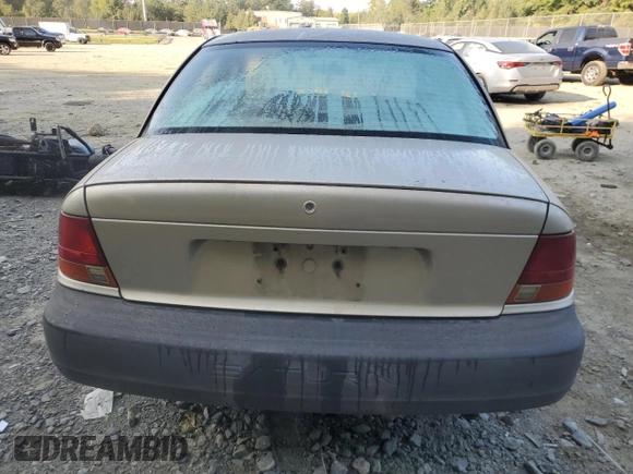 1997 Saturn SL with VIN 1G8ZH5285VZ365951, listed as a Copart auction lot 70902264 with 104,781 mi miles and Salvage Title. Bid and sale history available at carsss.com. Image 6.