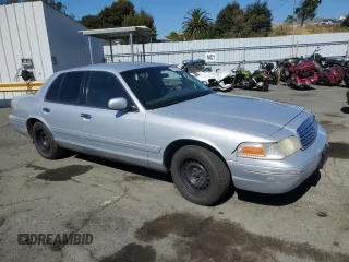2000 Ford Crown Victoria Police Police Interceptor with VIN 2FAFP71W4YX119755, listed as a Copart auction lot 68950904 with 208,260 mi miles and Salvage Title. Bid and sale history available at carsss.com. Image 4.