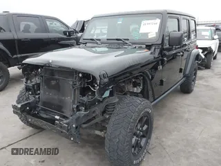 2021 Jeep Wrangler Unlimited Sport S with VIN 1C4HJXDG1MW856944, listed as a IAAI auction lot 41397210 with 39,471 mi miles. Bid and sale history available at carsss.com. Image 2.