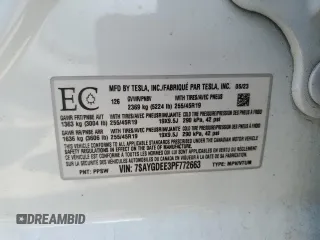 2023 Tesla Model Y Long Range z VIN 7SAYGDEE3PF772663, wystawiony jako Copart lot #56470455 z przebiegiem 50 705 mil mil oraz Czysty tytuł • Clean title. Historia ofert i sprzedaży dostępna na DreamBid. Obrazek 12.
