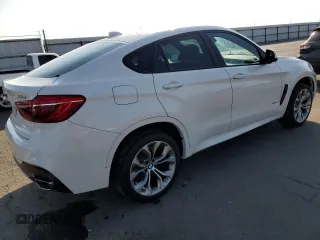 2018 BMW X6 xDrive35i with VIN 5UXKU2C52J0Z61957, listed as a Copart auction lot 73596543 with 87,119 mi miles. Bid and sale history available at carsss.com. Image 3.