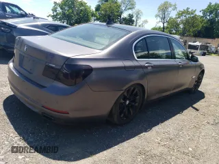 2013 BMW 7 Series 740Li xDrive z VIN WBAYF4C55DDE23588, wystawiony jako Copart lot #57968395 z przebiegiem 53 166 mil mil oraz Szkoda całkowita • Salvage title. Historia ofert i sprzedaży dostępna na DreamBid. Obrazek 3.