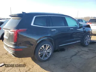 2021 Cadillac XT6 Premium Luxury z VIN 1GYKPCRS5MZ110015, wystawiony jako Copart lot #49323935 z przebiegiem 28 453 mil mil oraz Czysty tytuł • Clean title. Historia ofert i sprzedaży dostępna na DreamBid. Obrazek 3.