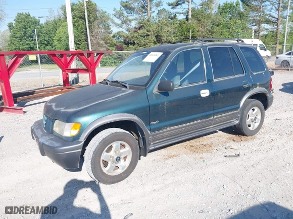2002 Kia Sportage with VIN KNDJA723425144951, listed as a IAAI auction lot 42049262 with 149,793 mi miles. Bid and sale history available at carsss.com. Image 2.