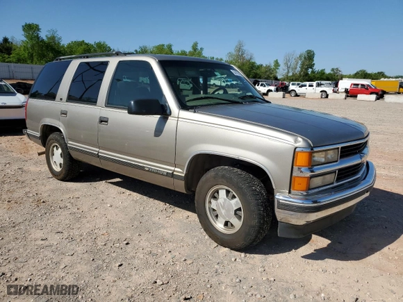 1999 Chevrolet Tahoe Limited with VIN 1GNEC13R5XR132083, listed as a Copart auction lot 54187405 with 167,548 mi miles and Clean Title. Bid and sale history available at carsss.com. Image 4.