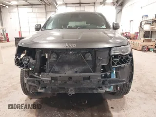 2016 Jeep Grand Cherokee Limited 75th Anniversary with VIN 1C4RJFBG2GC349154, listed as a IAAI auction lot 41392239 with 135,627 mi miles and . Bid and sale history available at DreamBid. Image 6.