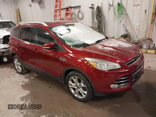 2015 Ford Escape Titanium with VIN 1FMCU9JX1FUA16707, listed as a IAAI auction lot 41536305 with 110,448 mi miles. Bid and sale history available at carsss.com. Image 1.
