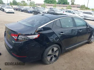 2012 Kia Optima Hybrid with VIN KNAGM4AD2C5014823, listed as a IAAI auction lot 42063169 with 125,235 mi miles. Bid and sale history available at carsss.com. Image 4.