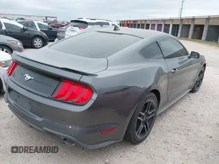 2021 Ford Mustang EcoBoost z VIN 1FA6P8TH9M5141038, wystawiony jako IAAI lot #41965588 z przebiegiem 35 344 mil mil oraz . Historia ofert i sprzedaży dostępna na DreamBid. Obrazek 4.