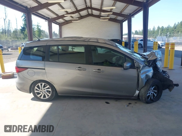 2012 Mazda 5 Sport with VIN JM1CW2BL3C0142202, listed as a IAAI auction lot 42397815 with Not provided miles and . Bid and sale history available at DreamBid. Image 14.