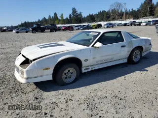 1987 Chevrolet Camaro z VIN 1G1FP21F8HN171560, wystawiony jako Copart lot #54089805 z przebiegiem 27 369 mil mil oraz Szkoda całkowita • Salvage title. Historia ofert i sprzedaży dostępna na DreamBid. Obrazek 1.