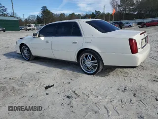 2001 Cadillac DeVille z VIN 1G6KD54Y61U227040, wystawiony jako Copart lot #46423295 z przebiegiem 180 289 mil mil oraz Szkoda całkowita • Salvage title. Historia ofert i sprzedaży dostępna na DreamBid. Obrazek 2.