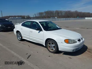 2004 Pontiac Grand Am SE1 with VIN 1G2NF52EX4M594173, listed as a IAAI auction lot 41812409 with 130,793 mi miles. Bid and sale history available at carsss.com. Image 1.