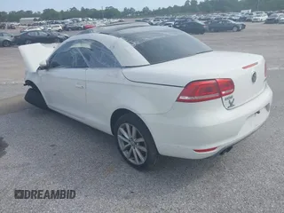 2012 Volkswagen Eos Komfort with VIN WVWBW7AH9CV017620, listed as a IAAI auction lot 40945479 with 96,444 mi miles and . Bid and sale history available at DreamBid. Image 3.